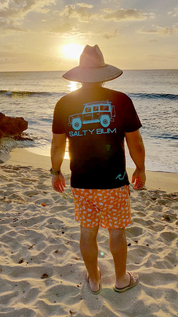 The Salty Bum Wanderer Tee short sleeve tee features the Salty Bum Logo on the front, the Salty Wagon design on the back, and our three signature waves on the bottom right side. This tee is made of 100% cotton to provide an extreme softness and a custom fit.